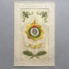 an embroidered silk postcard with an Army Service Corps cap badge