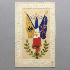 an embroidered silk postcard dated 1915 with a Royal Fusiliers regiment flag design
