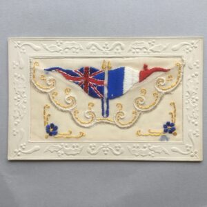 An embroidered WW1 silk postcard with a Royal Fusiliers Regiment insert