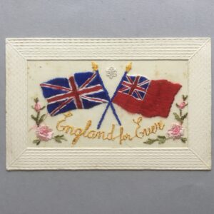 An embroidered silk patriotic postcard with flags
